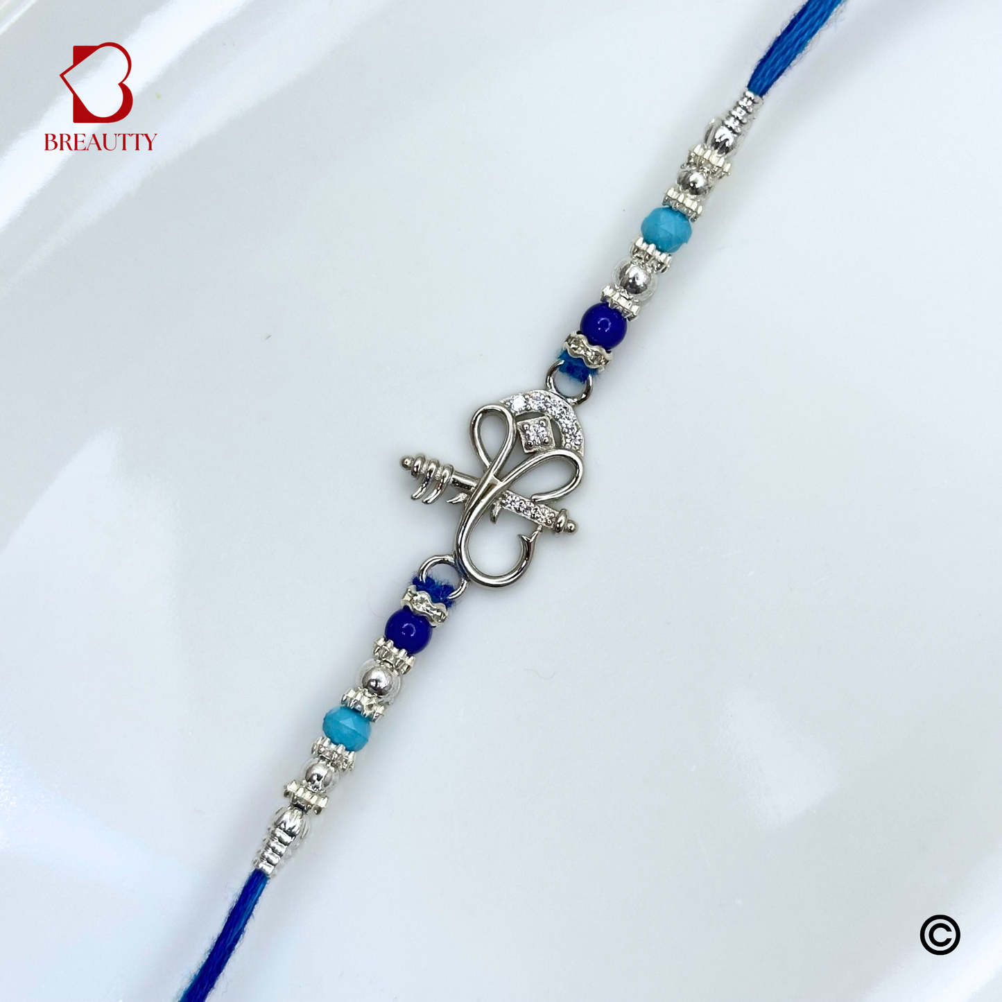 BREAUTTY RAKSHA BANDHAN 925 STERLING SILVER RAKHI "GANESHA" WITH BLUE THREAD | HALLMARKED SILVER RAKHI