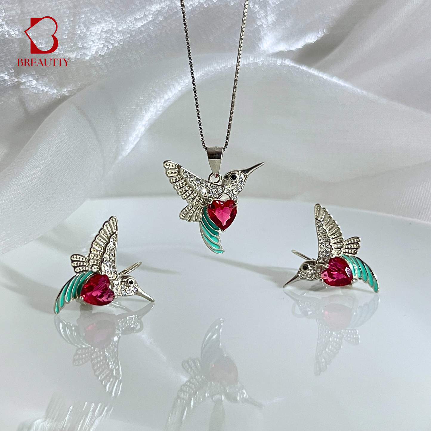 925 sterling silver pendant of humming birds