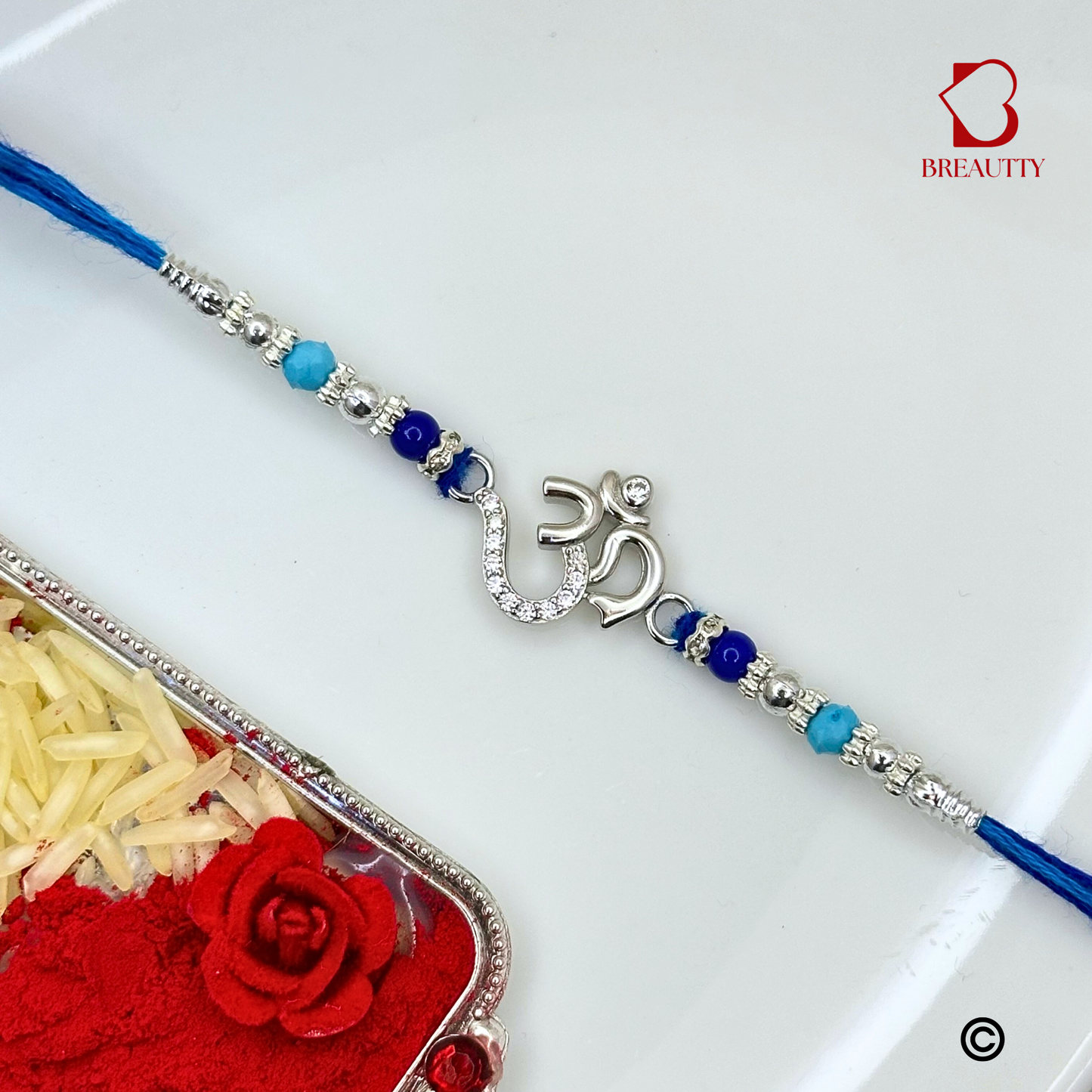 BREAUTTY RAKSHA BANDHAN 925 STERLING SILVER RAKHI "OM" WITH BLUE THREAD | HALLMARKED SILVER RAKHI