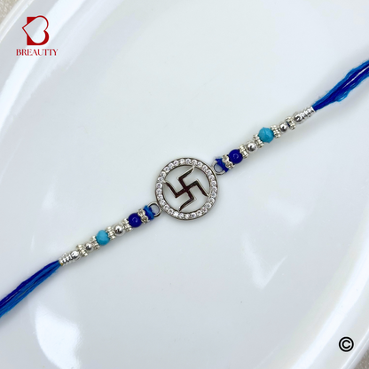 BREAUTTY RAKSHA BANDHAN 925 STERLING SILVER RAKHI  "SWASTIK"  WITH BLUE THREAD  | HALLMARKED SILVER  RAKHI