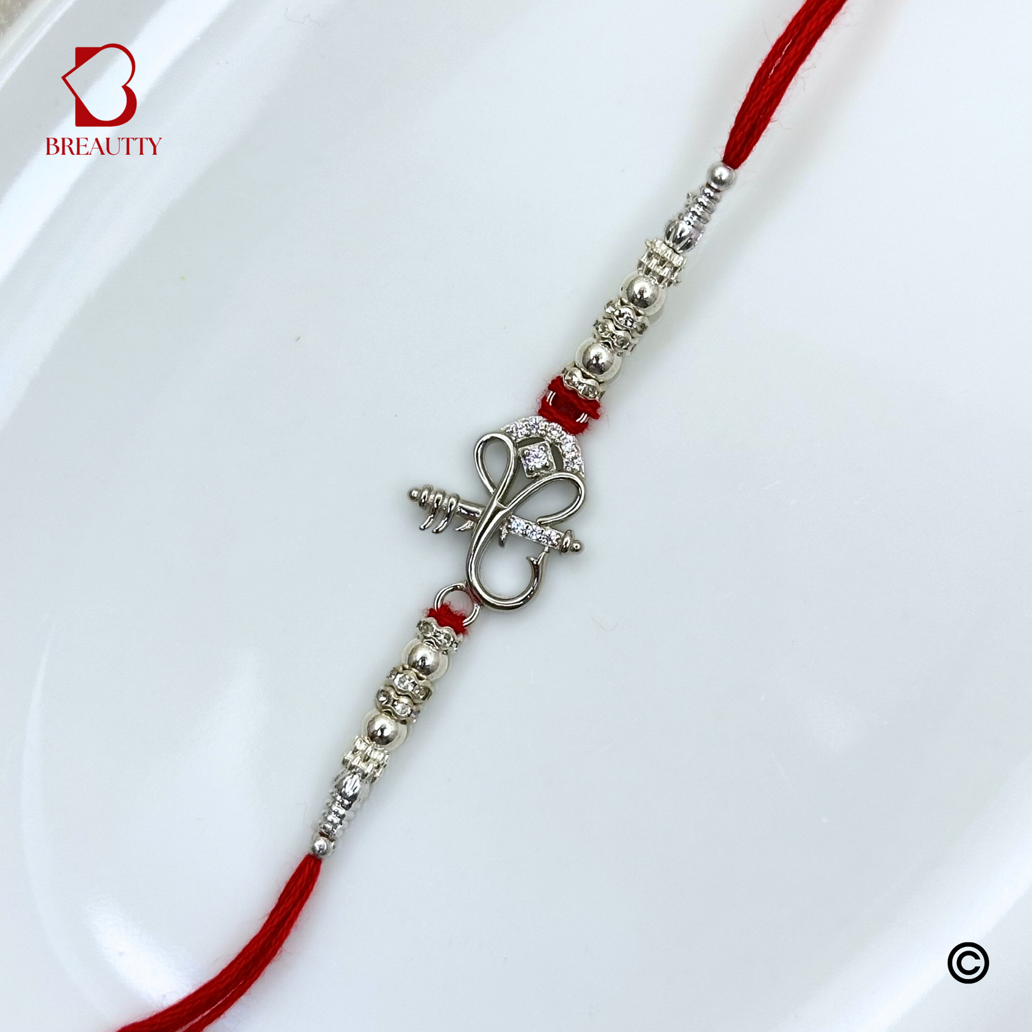 BREAUTTY RAKSHA BANDHAN 925 STERLING SILVER RAKHI  "GANESHA"  WITH RED THREAD  | HALLMARKED SILVER  RAKHI
