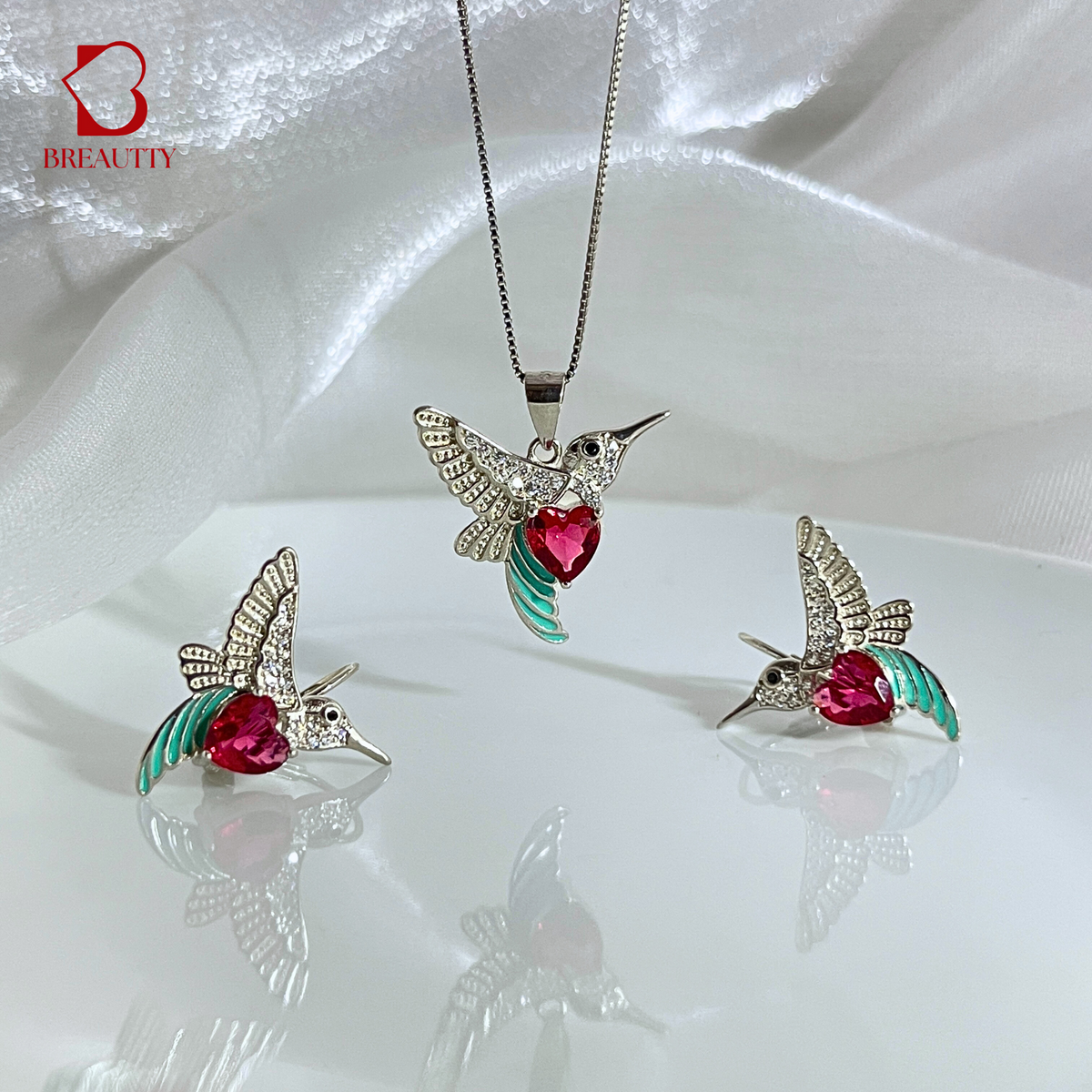 925 sterling silver pendant of humming birds