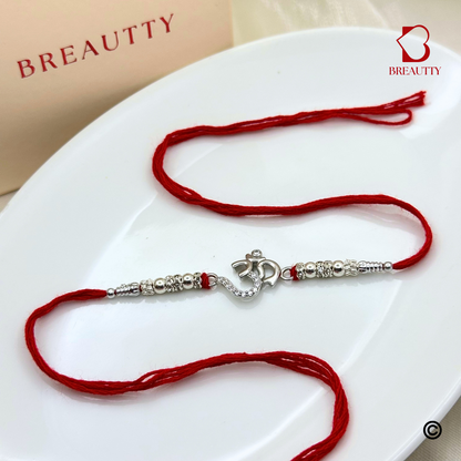 BREAUTTY RAKSHA BANDHAN 925 STERLING SILVER RAKHI  "OM"  WITH RED THREAD  | HALLMARKED SILVER  RAKHI