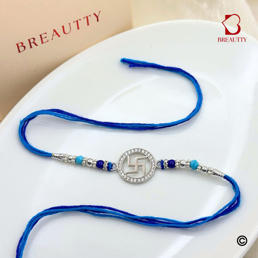 BREAUTTY RAKSHA BANDHAN 925 STERLING SILVER RAKHI  "SWASTIK"  WITH BLUE THREAD  | HALLMARKED SILVER  RAKHI