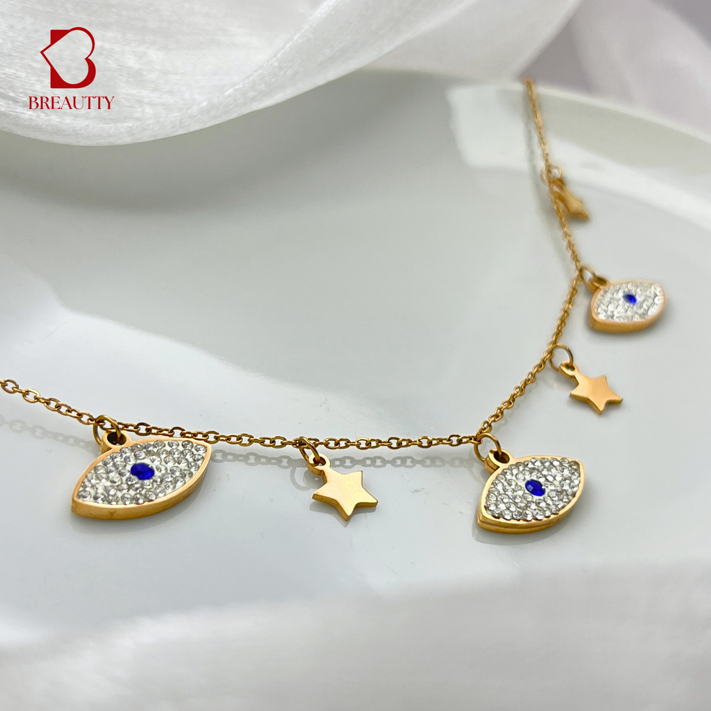 BREAUTTY ROSE GOLD PLATED  NECKLACE WITH EVIL EYE CHARMS AND STARS