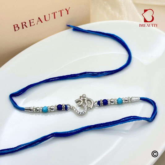 BREAUTTY RAKSHA BANDHAN 925 STERLING SILVER RAKHI  "OM"  WITH BLUE THREAD  | HALLMARKED SILVER  RAKHI