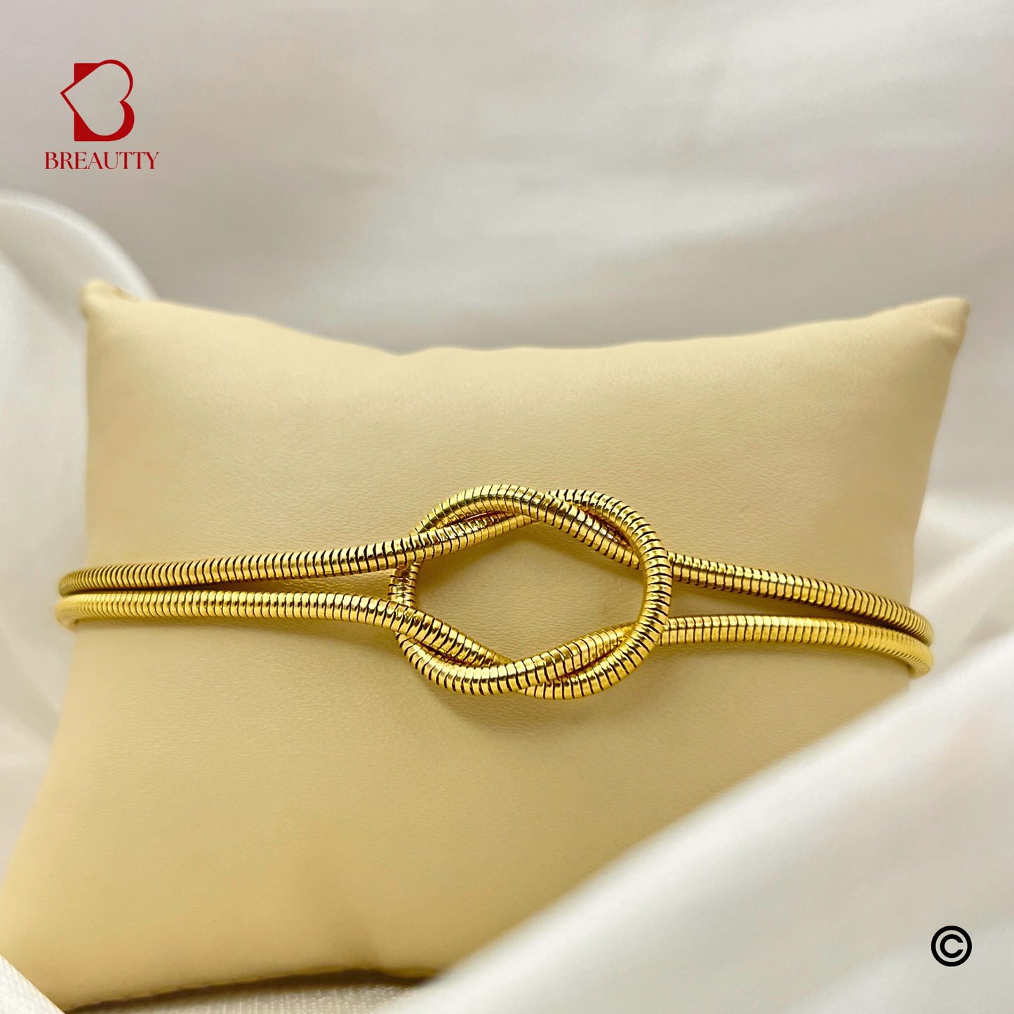 BREAUTTY 18K GOLD PLATED KNOT DESIGN BRACELET