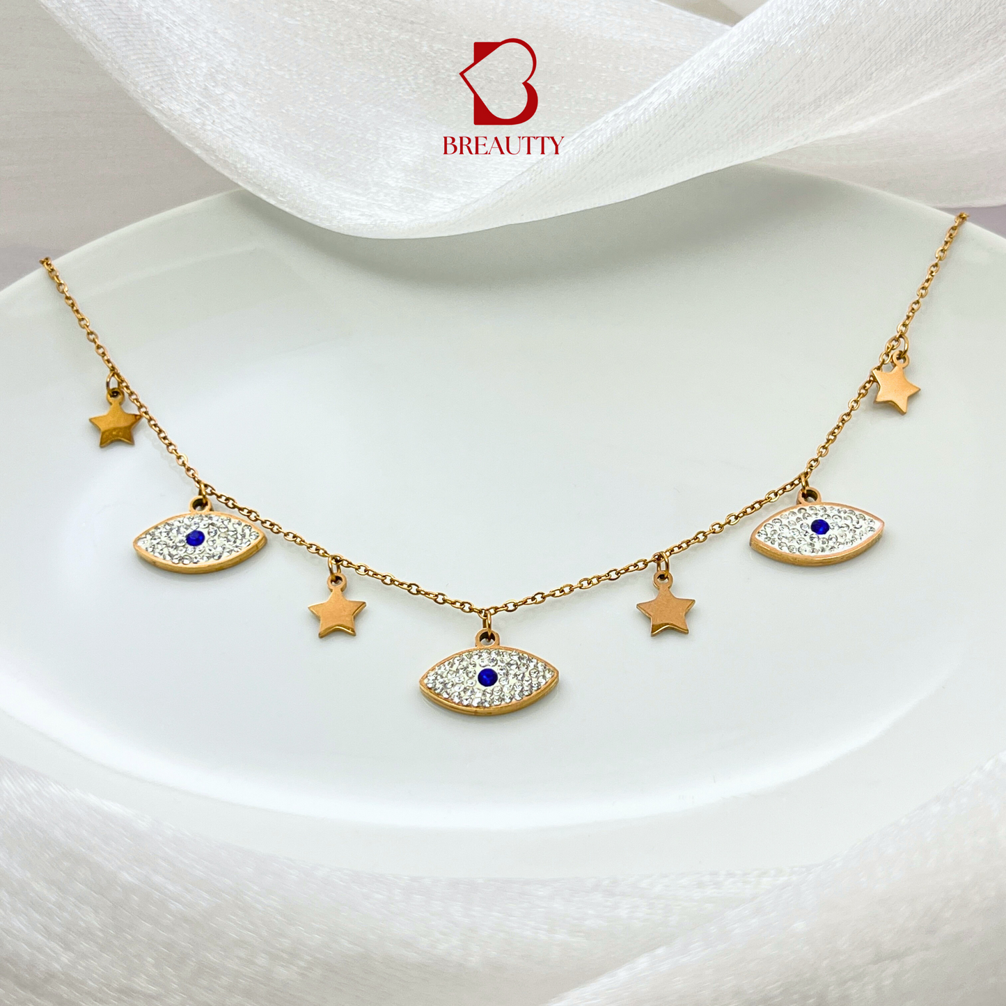 BREAUTTY ROSE GOLD PLATED  NECKLACE WITH EVIL EYE CHARMS AND STARS