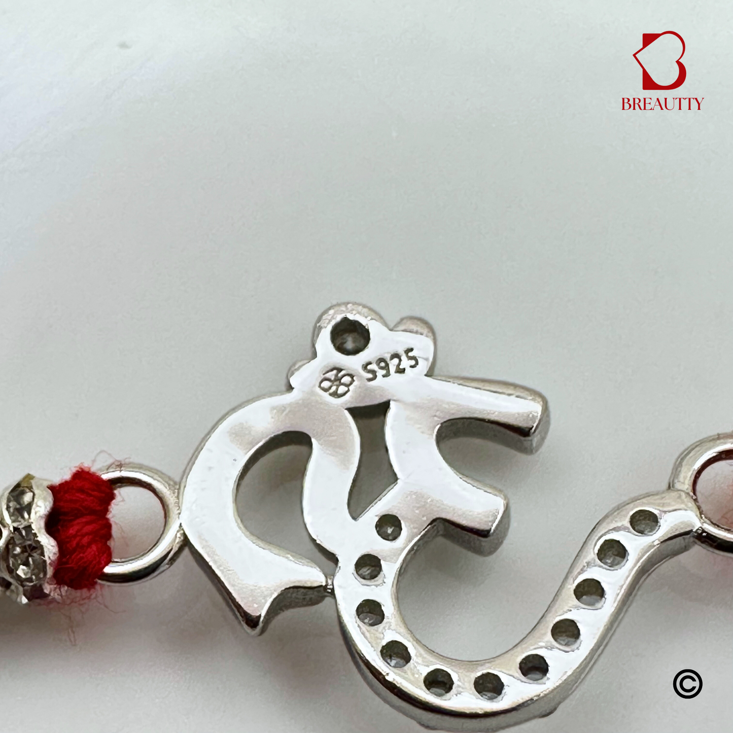 BREAUTTY RAKSHA BANDHAN 925 STERLING SILVER RAKHI  "OM"  WITH RED THREAD  | HALLMARKED SILVER  RAKHI