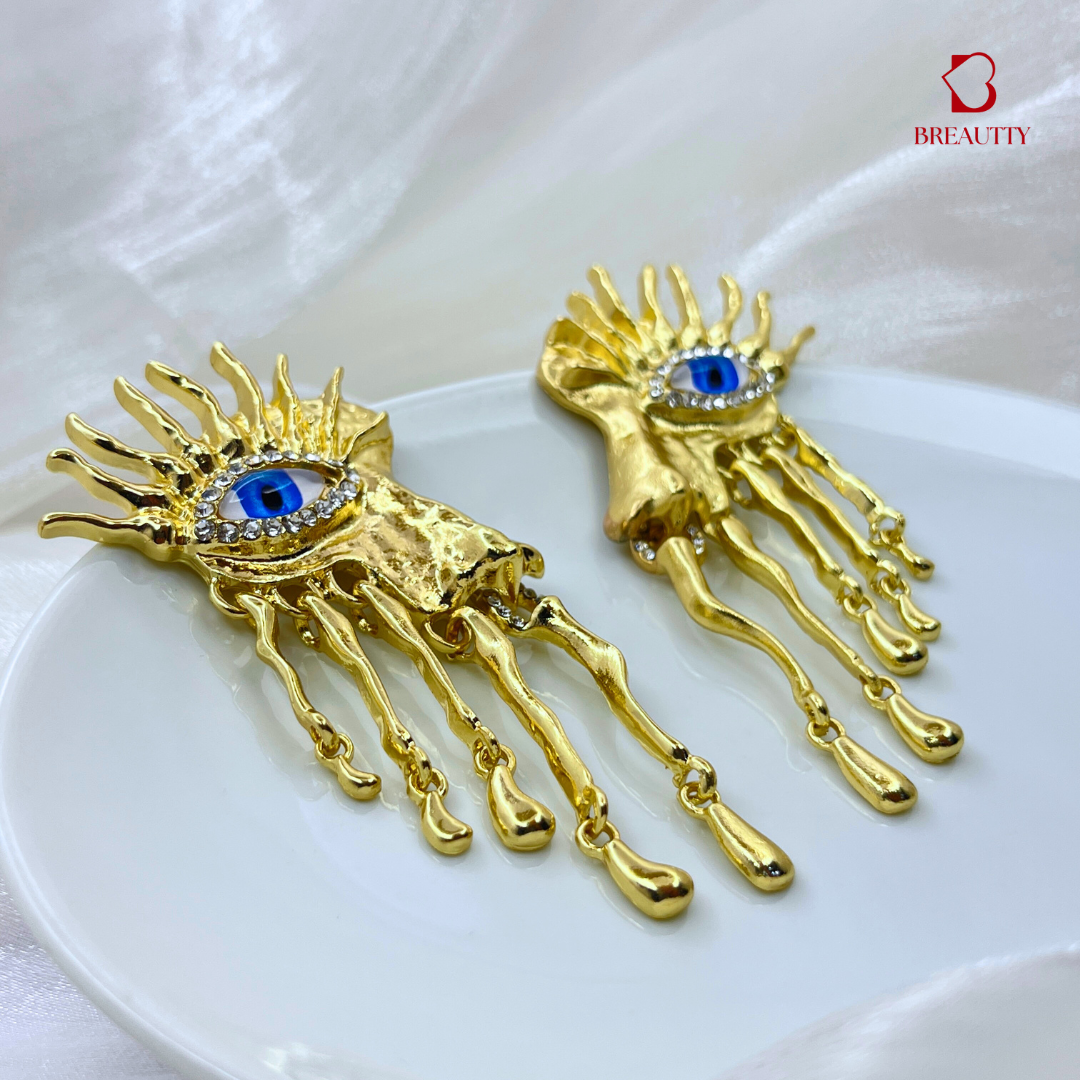 BREAUTTY GOLDEN GUARDIAN EVIL EYE EARRINGS