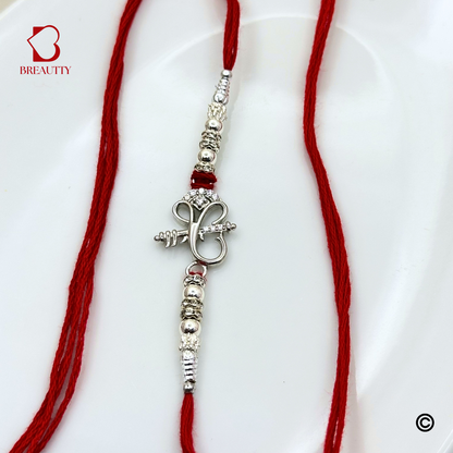 BREAUTTY RAKSHA BANDHAN 925 STERLING SILVER RAKHI  "GANESHA"  WITH RED THREAD  | HALLMARKED SILVER  RAKHI
