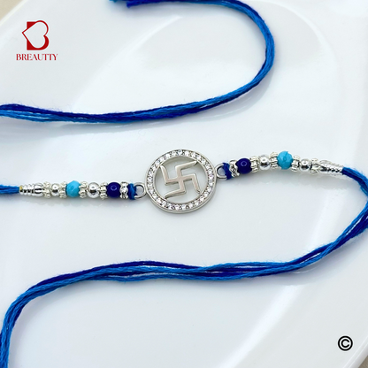 BREAUTTY RAKSHA BANDHAN 925 STERLING SILVER RAKHI  "SWASTIK"  WITH BLUE THREAD  | HALLMARKED SILVER  RAKHI