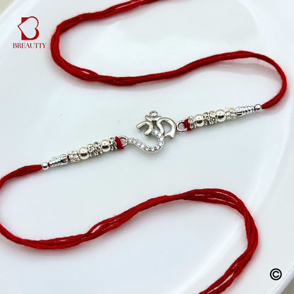 BREAUTTY RAKSHA BANDHAN 925 STERLING SILVER RAKHI  "OM"  WITH RED THREAD  | HALLMARKED SILVER  RAKHI