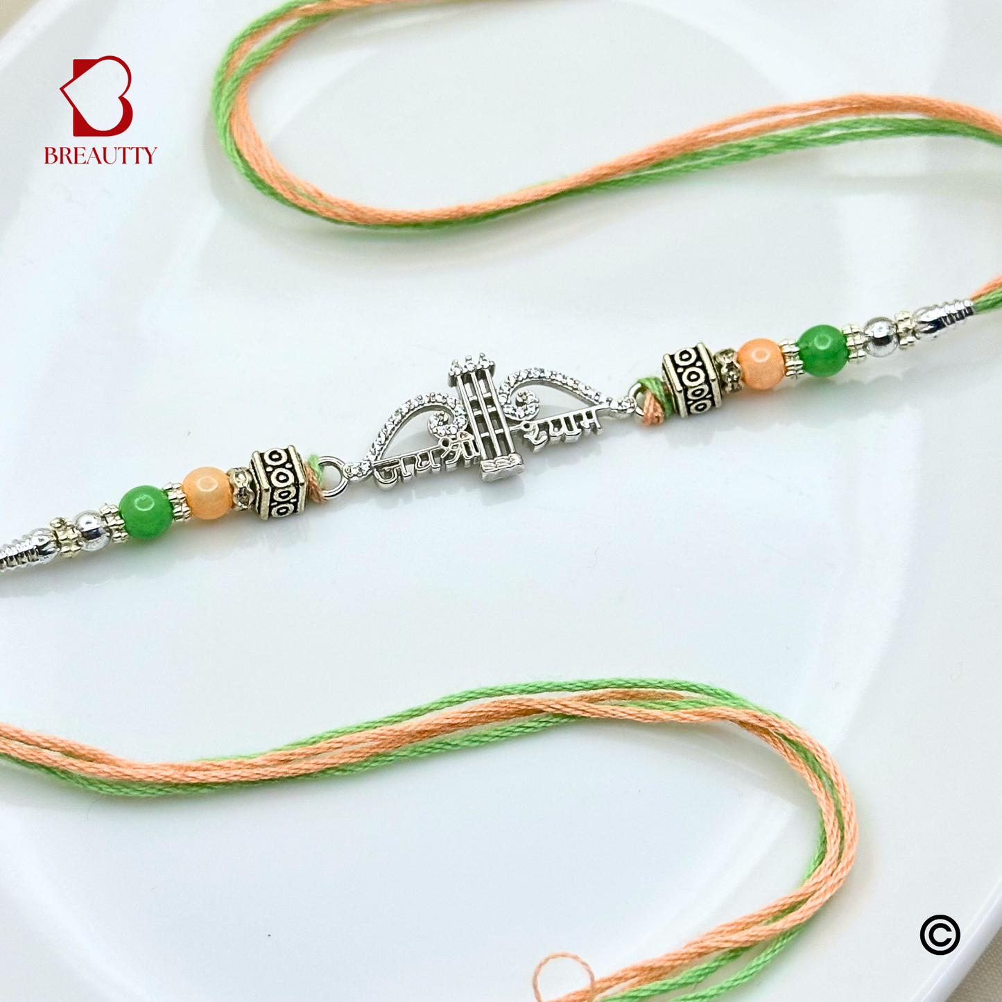 BREAUTTY RAKSHA BANDHAN 925 STERLING SILVER RAKHI  "BAAN"  WITH GREEN THREAD  | HALLMARKED SILVER  RAKHI