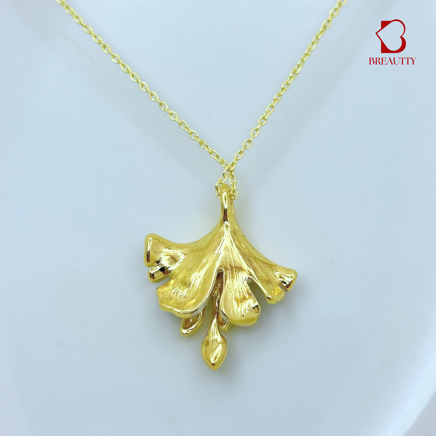 BREAUTTY GINKGO LEAF PENDANT SET – 18K GOLD PLATED WITH MOTHER OF PEARL & GREEN ZIRCON ACCENTS