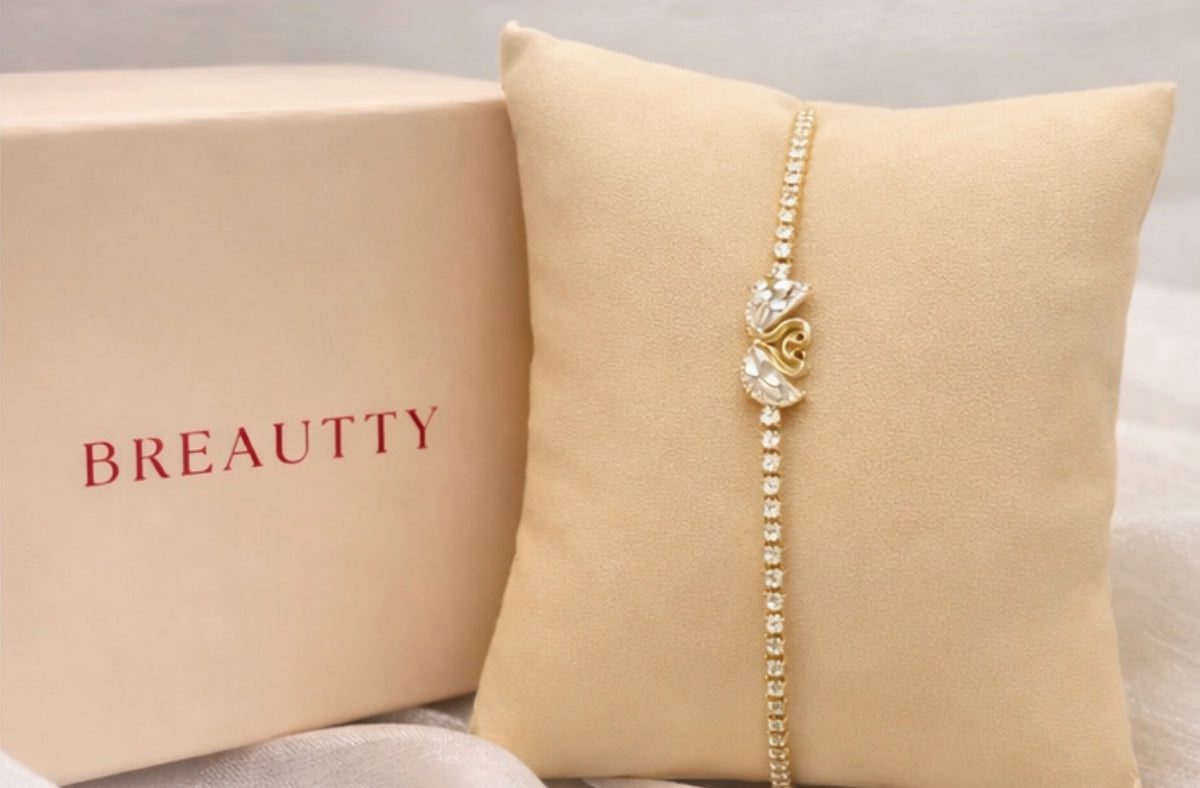 BREAUTTY 18K GOLD PLATED SWAN TENNIS BRACELET IN CHAIN | WATERPROOF